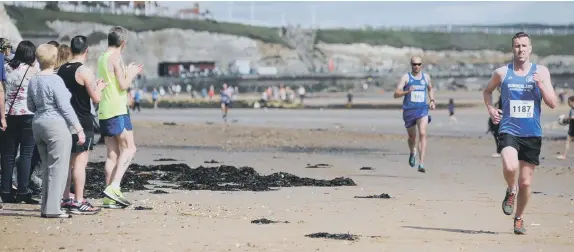  ??  ?? Action from last year’s Sunderland Strollers Pier-to-Pier race.