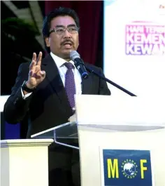  ??  ?? Johari delivers his speech in launching the Finance Ministry’s annual open day yesterday. — Bernama photo