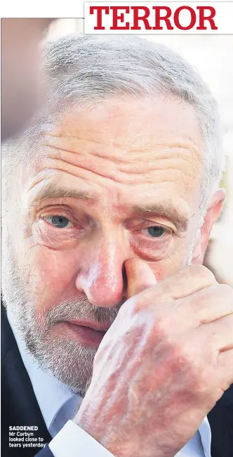  ??  ?? SADDENED Mr Corbyn looked close to tears yesterday