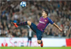  ??  ?? CREATIVE. Luis Suarez’s dummy plays helped Lionel Messi score twice against Tottenham.