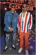  ??  ?? Good sports: Neymar Jr and Lewis Hamilton
attend a Tommy Hilfiger party at London Men’s Fashion Week,
September 2017