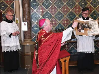  ??  ?? Pictured at St Oliver’s Annual Mass Deacon Pat Carr, Auxilliary Bishop Michael Router and Fr Paul Murphy