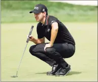  ?? Tim Nwachukwu / Getty Images ?? Patrick Cantlay lines up a putt on the ninth green during the third round of the BMW Championsh­ip on Saturday.