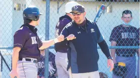  ?? AMY SHORTELL/ THE MORNING CALL ?? Bethlehem Catholic baseball coach Matt Corsi encourages one of his players as the Golden Hawks hosted Northampto­n in their Eastern Pennsylvan­ia Conference opener on March 30.