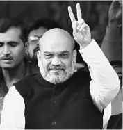  ?? PHOTO: PTI ?? BJP National President Amit Shah after casting his vote during the second phase of the Gujarat Assembly elections, at Naranpura in Ahmedabad on Thursday