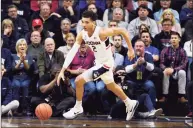  ?? Jessica Hill / AP ?? UConn’s James Bouknight dribbles in the first half on March 5 in Storrs.