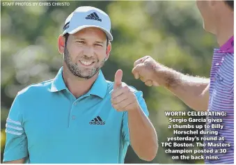  ?? STaff phoTos by ChRIs ChRIsTo ?? WORTH CELEBRATIN­G: Sergio Garcia gives a thumbs up to Billy Horschel during yesterday’s round at TPC Boston. The Masters champion posted a 30 on the back nine.