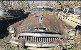  ?? CURTIS COMPTON / CCOMPTON@AJC.COM ?? A 1953 Buick sports more chrome than 10 of today’s cars at Old Car City USA.