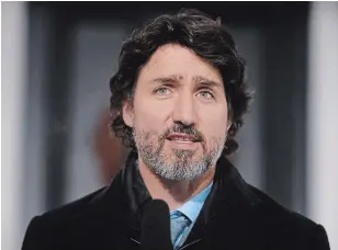  ?? ADRIAN WYLD THE CANADIAN PRESS ?? Prime Minister Justin Trudeau said Ottawa was working “to get vaccines delivered.”