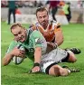  ??  ?? Matt Faddes rushes in the penultimat­e try for the Highlander­s during their spectacula­r 45-41 win against the Cheetahs.