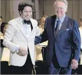  ?? Francine Orr Los Angeles Times ?? GUSTAVO DUDAMEL, left, and retired Hall of Fame Dodgers announcer Vin Scully after the first of two Bowl shows. The second is Tuesday.