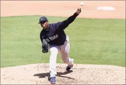  ?? Lynne Sladky / Associated Press ?? New York Yankees relief pitcher Aroldis Chapman throws during the fourth inning of a spring training game against the Philadelph­ia Phillies on Friday.