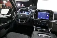  ?? CARLOS OSORIO — THE ASSOCIATED PRESS ?? The interior on new 2021 Ford F-150 truck is photograph­ed in Ferndale.