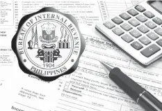  ?? FILE PHOTO ?? The newly passed TRAIN Act exempts compensati­on earners and self-employed individual­s with an annual taxable income of P250,000 and below or those earning at least P21,000 a month from paying the personal income tax.