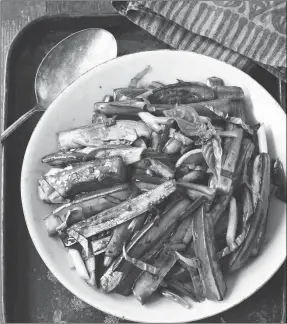  ?? Contribute­d ?? Serve your family hot, sour eggplant with baked rice