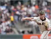  ?? GODOFREDO A. VÁSQUEZ — AP PHOTO ?? San Francisco Giants pitcher Logan Webb throws against the Miami Marlins during the second inning of a baseball game in San Francisco.