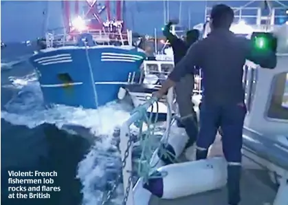  ??  ?? Violent: French fishermen lob rocks and flares at the British