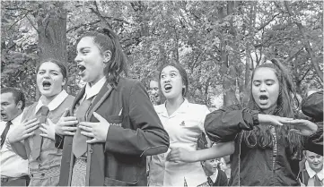  ??  ?? School students perform the hakka during a vigil in Christchur­ch three days after a shooting incident at two mosques in the city that claimed the lives of 50 Muslim worshipper­s. — AFP photo