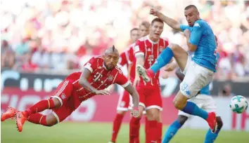  ?? — Reuters ?? Bayern Munich’s Arturo Vidal in action with Napoli’s Nikola Maksimovic before Kalidou Koulibaly scores their first goal.