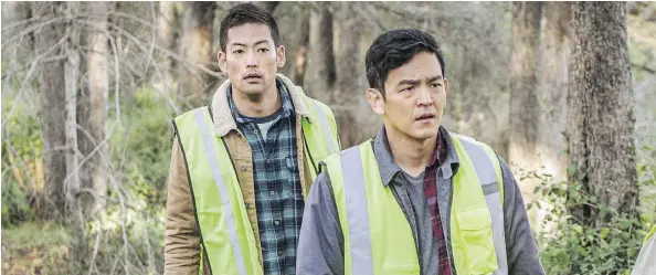  ?? SCREEN GEMS ?? Joseph Lee, left, and John Cho star in Searching, which collected a modest $5.7 million at last weekend’s box office.