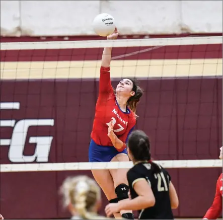  ?? Photos by Jerry Silberman / risportsph­oto.com ?? Led by senior outside hitter Issa Miller (27, above) and sophomore middle Paige McCreight (7, below), No. 4 Mount St. Charles was in position to beat No. 1 North Kingstown in the Division I semifinals. After taking the second game, the Mounties had chances to win each of the final two games, but NK battled back to win the match in four games.