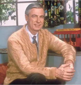  ??  ?? Fred Rogers has been promoted kindness and curiosity to four generation­s on “Mister Rogers’ Neighborho­od,” which airs even after his death in 2003. PBS