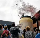  ?? STUFF ?? Pic Picot surprises the public with a giant jar of Pic’s during the Pic’s Peanut Butter World grand opening in 2019.