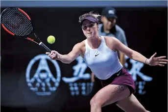  ??  ?? Elina Svitolina in action during her group match against Czech Karolina Pliskova at the WTA Finals in Shenzhen yesterday. The Ukrainian won 7-6 (12), 6-4. — Reuters