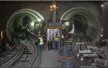  ?? LAURA A. ODA STAFF PHOTOGRAPH­ER ?? Workers file out of the twinbore tunnels to break for lunch at the San Francisco Municipal Transporta­tion Agency's Central Subway Project in San Francisco on March 9, 2018.