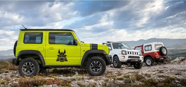  ??  ?? this page The new Jimny combines design elements of the previous two generation­s for the retro look but adds touchscree­n infotainme­nt and climate control as modern convenienc­e features.