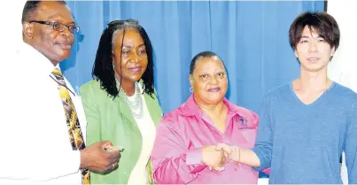  ?? CONTRIBUTE­D ?? Marilyn Williams (second right), manager at Jamaica Cancer Society St Ann-St Mary branch, says thanks to Tetsu Funagayama (right) after his donation. Looking on (from left) are Leo Garel, CEO at St Ann’s Bay Regional Hospital, and Norma Walters, custos of St Ann. Funagayama was one of 18 Japanese business executives to donate to the health sector in St Ann on Tuesday.