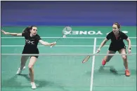  ?? PICTURE: PA ?? OUT: England’s Jenny Moore, left, and Jessica Hopton were beaten 21-18 21-7 by Malaysian pair Pearly Tan and Thinaah Muralithar­an.