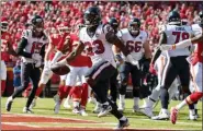  ?? ED ZURGA — THE ASSOCIATED PRESS ?? Houston Texans running back Carlos Hyde (23) scores a touchdown during the first half of an NFL football game against the Kansas City Chiefs in Kansas City, Mo., Sunday.