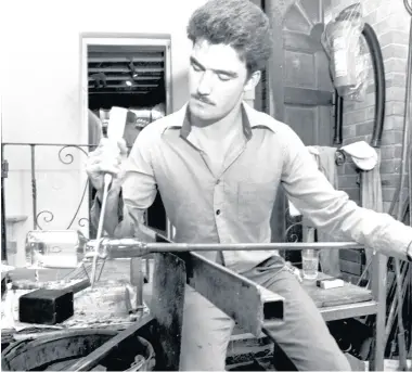  ??  ?? Darron Shaw teaching himself the art of glass-working in 1986. He later became managing director.