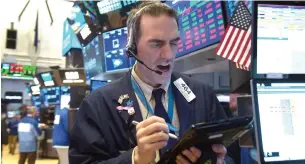  ?? AFP ?? Utilities, real estate, telecommun­ications and consumer staples all saw their stocks fall into early June even as the US benchmark S&P 500 index rose more than four per cent. —