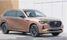  ?? ?? THE CX-80 is geneticall­y very similar to its smaller sibling, even sharing its front end and all that lies beneath the bonnet.