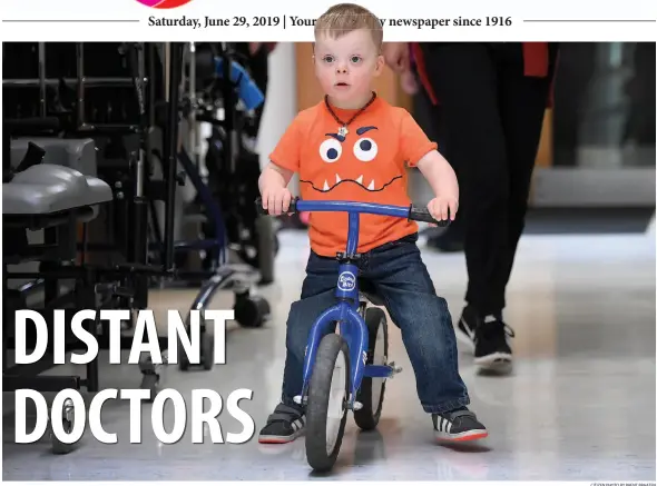  ?? CITIZEN PHOTO BY BRENT BRAATEN ?? Karver Fuller, 3, rides a bike at the Child Developmen­t Centre.