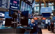  ?? Craig Ruttle/Associated Press ?? Traders work on the floor of the New York Stock Exchange in March. U.S. markets are far outpacing their global counterpar­ts in 2024, continuing a decades-long trend of strong growth compared with the rest of the world.