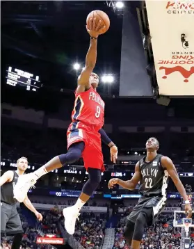  ?? (AP PHOTO/TYLER KAUFMAN) ?? QUALITY MINUTES. Just 20 games into his new team, Rajon Rondo now owns the franchise record for most assists in a single game in New Orleans.