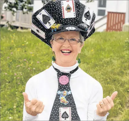  ?? JOE GIBBONS/THE TELEGRAM ?? Marie Barrett of St. John’s was dressed for the occasion, hoping to cash in on the Chase the Ace draw in Goulds, before it was postponed.