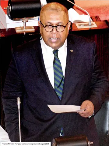  ??  ?? Finance Minister Mangala Samaraweer­a presents budget 2018