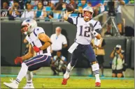  ?? Chris Keane / Associated Press ?? New England Patriots quarterbac­k Tom Brady throws a pass against the Carolina Panthers on Aug. 24.