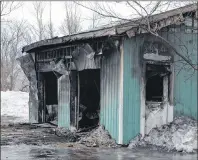 ?? ERIC MCCARTHY/JOURNAL PIONEER ?? A detached garage and the vehicles inside were destroyed by fire Thursday night in O’Leary.