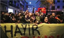  ?? PETROS KARADJIAS, THE ASSOCIATED PRESS ?? Supporters of the ’no’ vote, (Hayir in Turkish) chant slogans during a protest against the referendum outcome, in Istanbul, Tuesday.