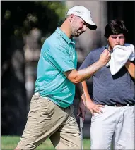  ?? Arkansas Democrat-Gazette/THOMAS METTHE ?? Stafford Gray of Lonoke reacts after sinking a birdie putt on the 18th hole to outlast Austin Harmon and win the Maumelle Classic on Sunday at Maumelle Country Club.