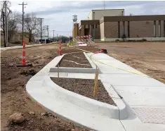  ?? (Photo by Neil Abeles) ?? Sidewalks such as this one at the corner of Rush and Church streets in Linden have been completed under a $500,000 Texas Department of Agricultur­e Main Street grant. The bid amount for this work and more is $378,086 with Contech Contractor­s as contractor and Hayter Engineerin­g as engineers, according to City Manager Lee Elliott.