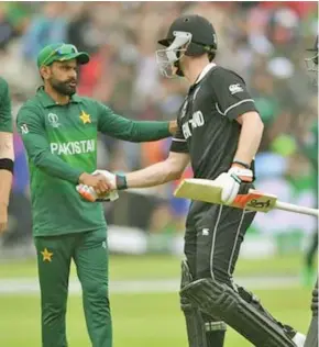  ?? Cricket News ?? Pakistan and New Zealand cricket players congratula­ting each other after last weeks Test. Photo: