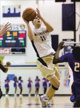  ??  ?? Senior Nathan Hoover has helped the Arlington Tigers to a 20-7 record. He will play college basketball at Wofford.