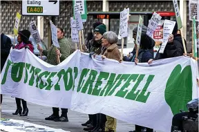  ?? Pictures: STEVE REIGATE ?? Demonstrat­ors outside the inquiry into the Grenfell Tower fire yesterday