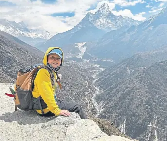  ?? ?? HE DID IT: Frankie McMillan, an eight-year-old from Cumbria who reached Everest base camp. His mother Basia said: ‘He managed all the way all by himself – if anything, I think he was stronger than me.’